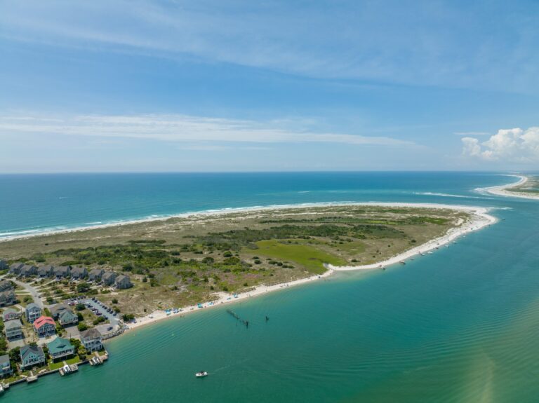 Aerial view of Serenity Point at the south end of Topsail Beach with ocean and sound on either side