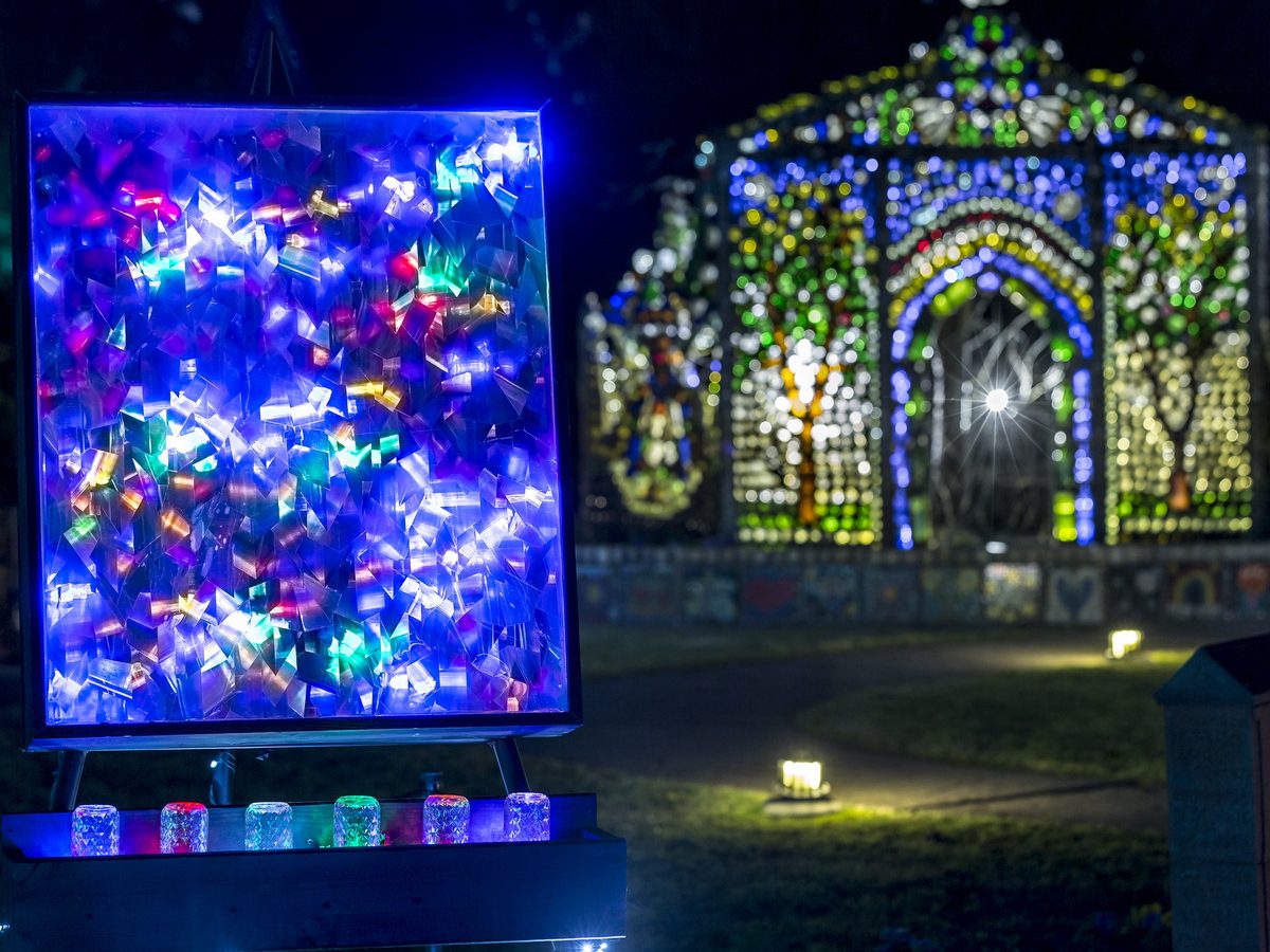 The Minnie Evans Bottle Chapel lit at night