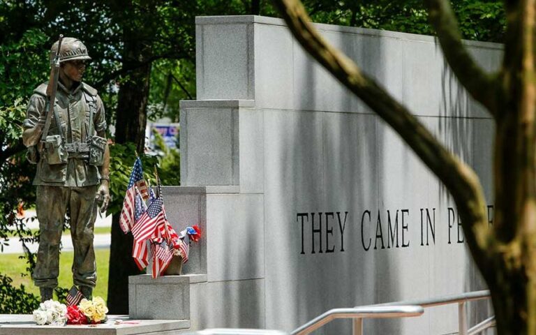 The Beirut Memorial wall and statue at Lejeune Memorial Gardens