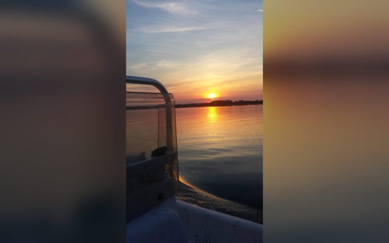 Sunset over the sound from a Tuck's Water Shuttle boat