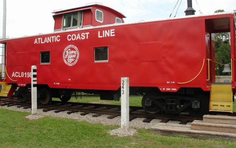 The red Atlantic Coast Line caboose outside the museum
