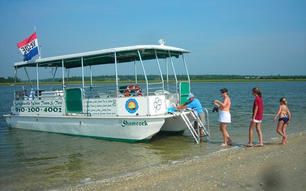 The tour boat landed on the beach at Masonboro Island
