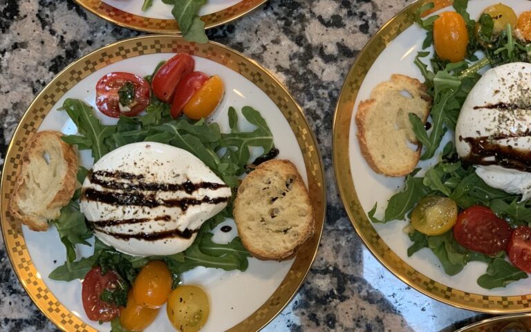 Plates of burrata salad from above