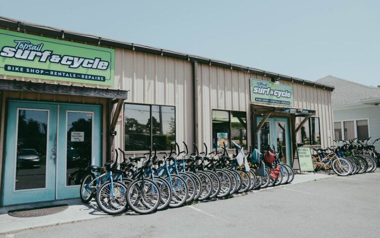 Rows of rental bikes outside the Topsail Surf and Cycle shop