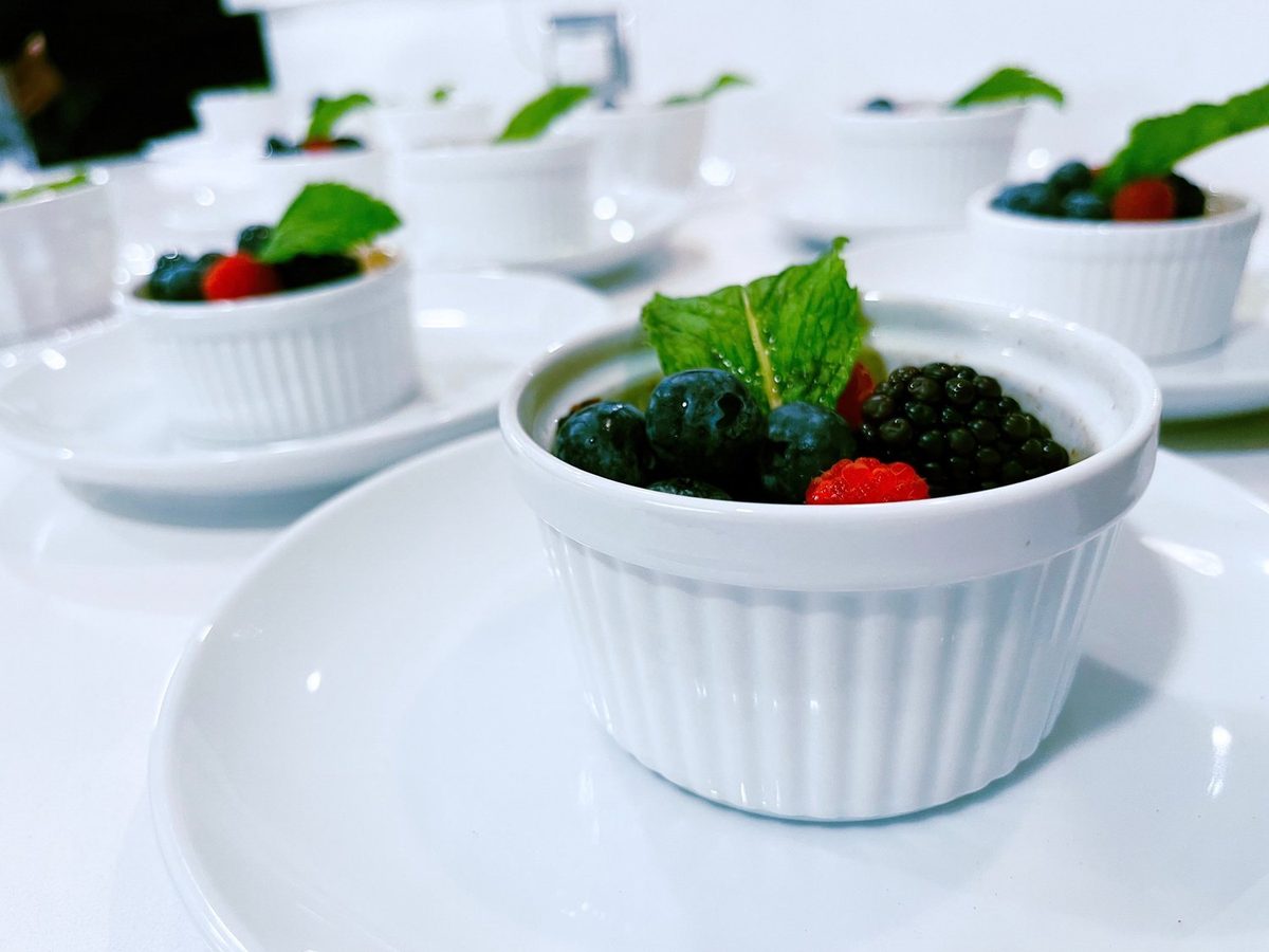 Berry desserts in white ramekins