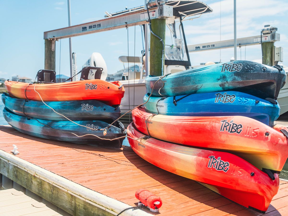 Stacks of kayaks on the dock
