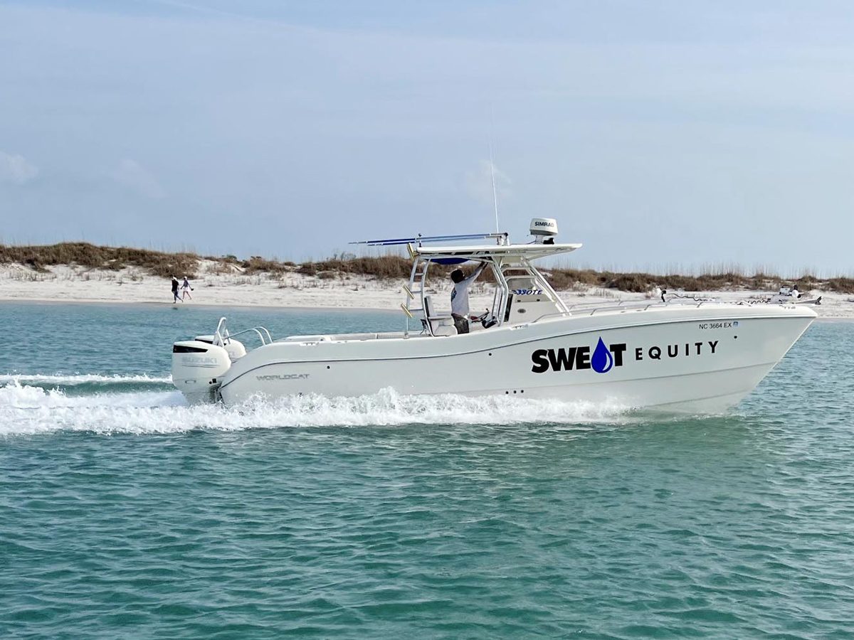 The catamaran running along the dunes