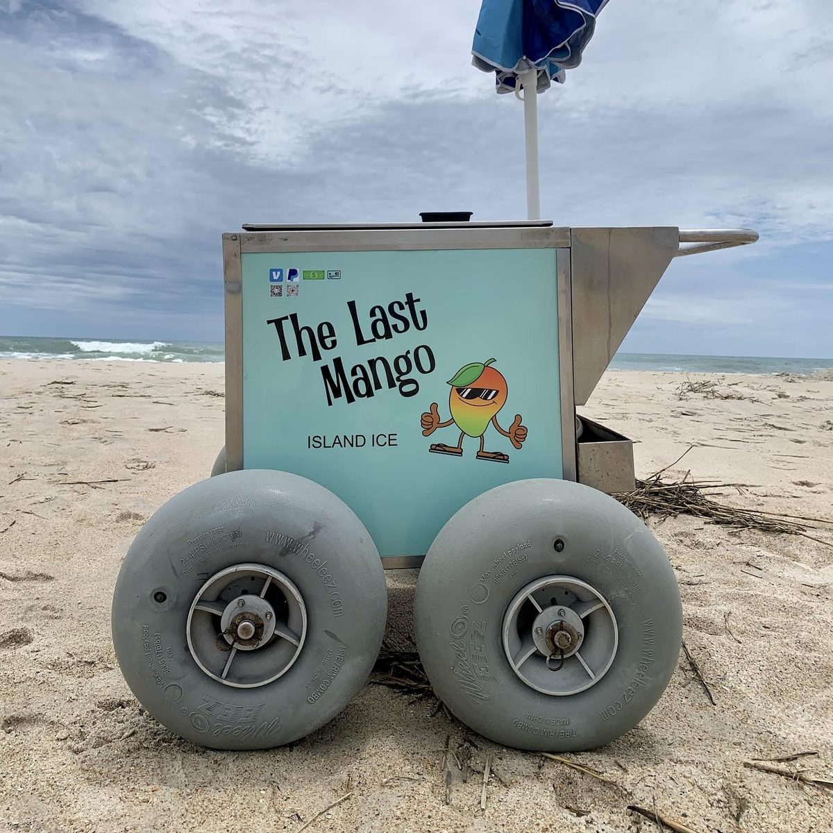 The Last Mango’s Italian ice cart parked on the sand